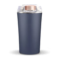 Blue electric mini flour mill and grain grinder with stainless steel construction on a kitchen countertop.