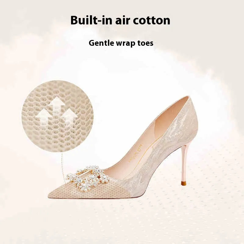 Champagne gold pointed toe stiletto high heel pumps with slip-on closure on a plain background.
