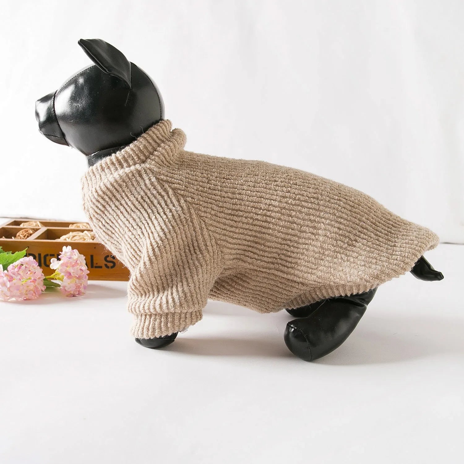Brown cloth pullover sweater on a small dog, showing casual style and fit for breeds like Bichon or Pomeranian.