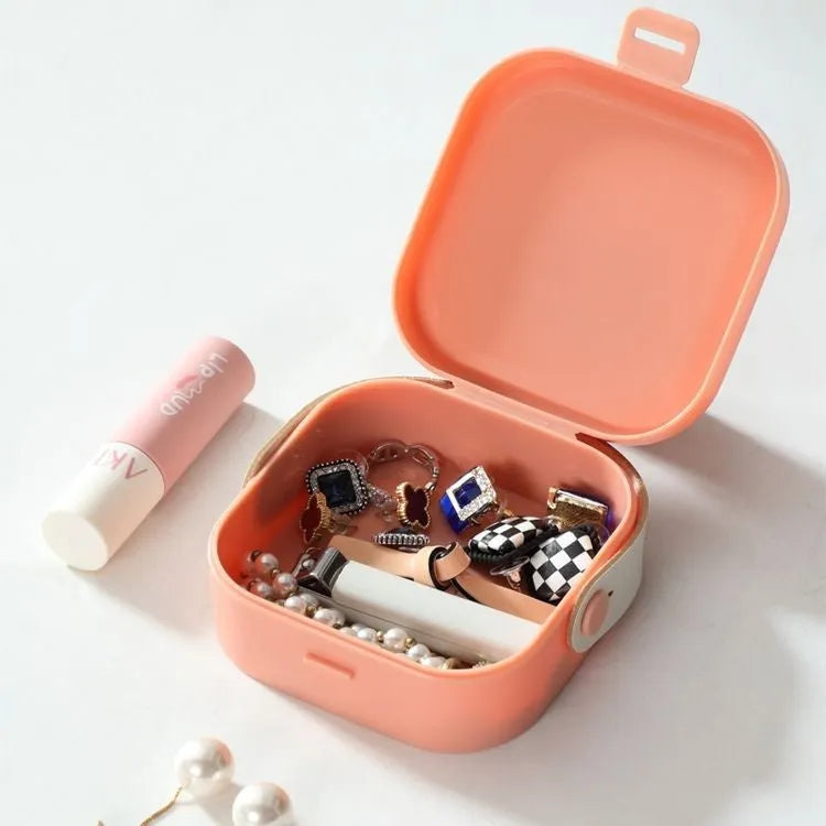 Medium solid colour polypropylene storage box for organising cables, shown in Nordic White.