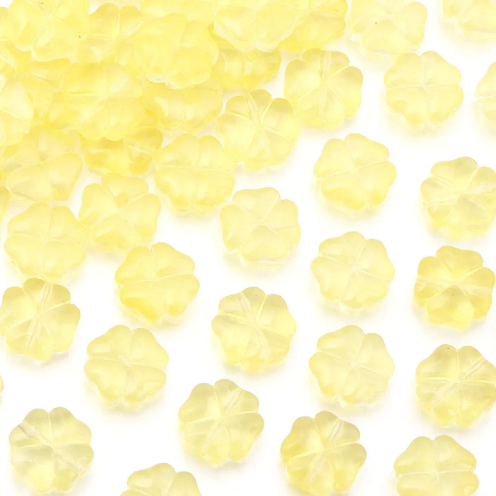 50 glass four-leaf clover beads in assorted colours with coloured glaze finish and 10mm straight hole design.