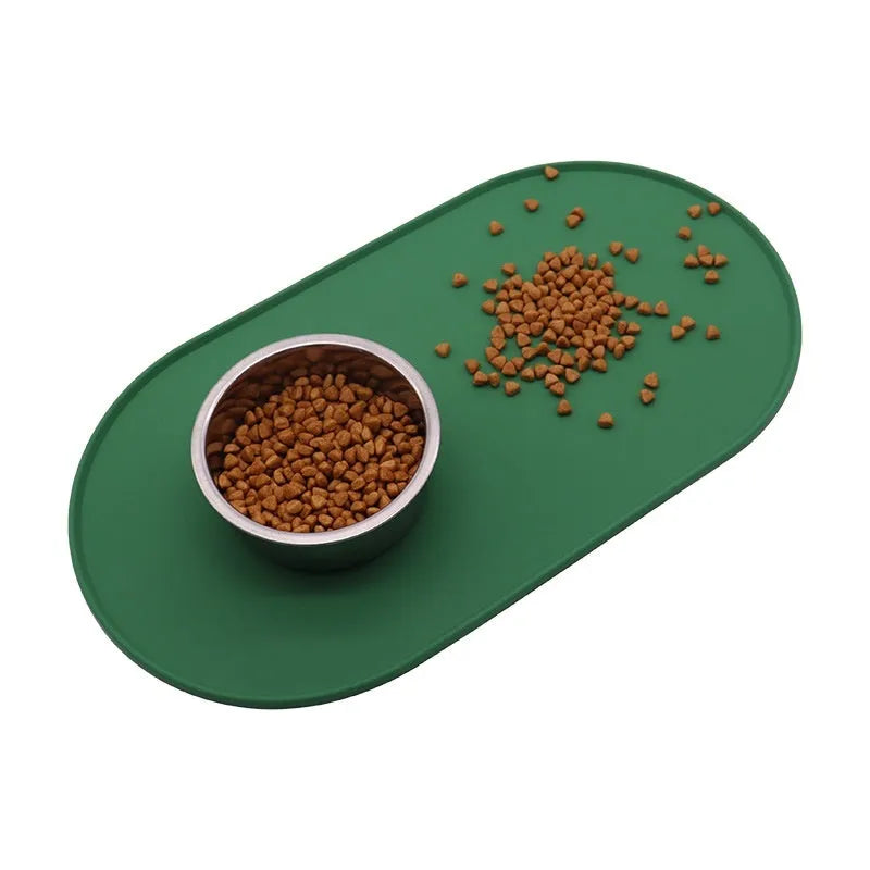 Silicone cat feeding placemat in beige showing food and water bowl placement