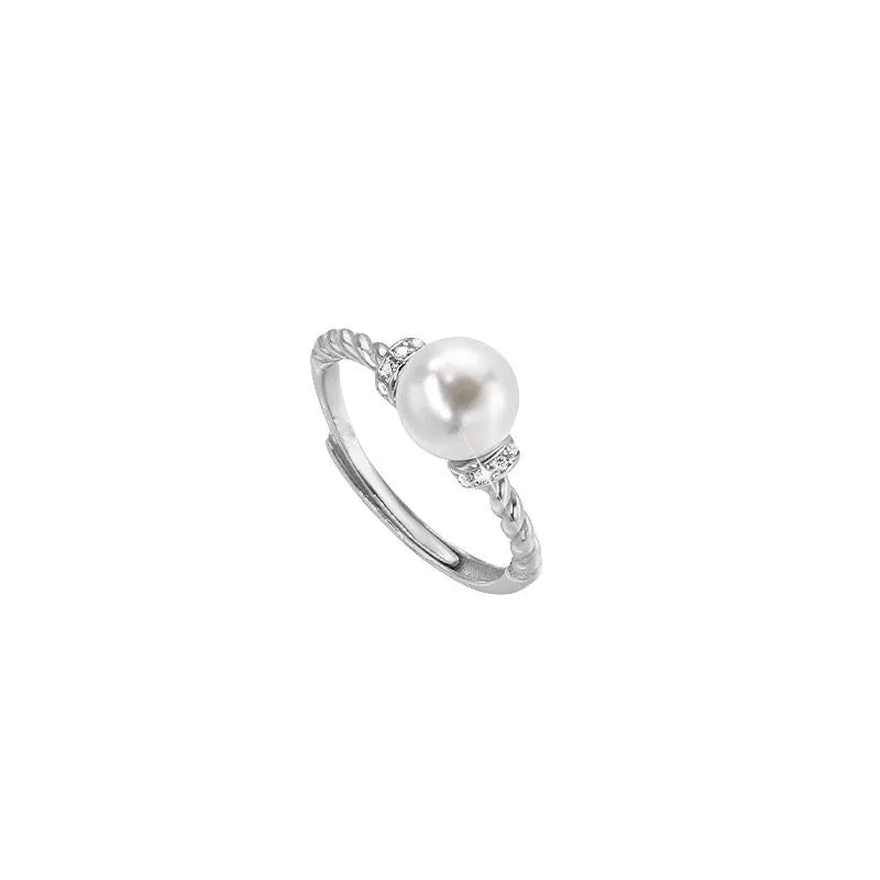 Adjustable antique twist pearl ring with geometric inlay design on copper band