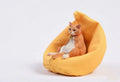 Lazy cat model ornament with sofa on car dashboard, 7.5cm high resin decoration.