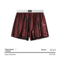 Man wearing galaxy reflective silver loose-fit woven polyester sports shorts.