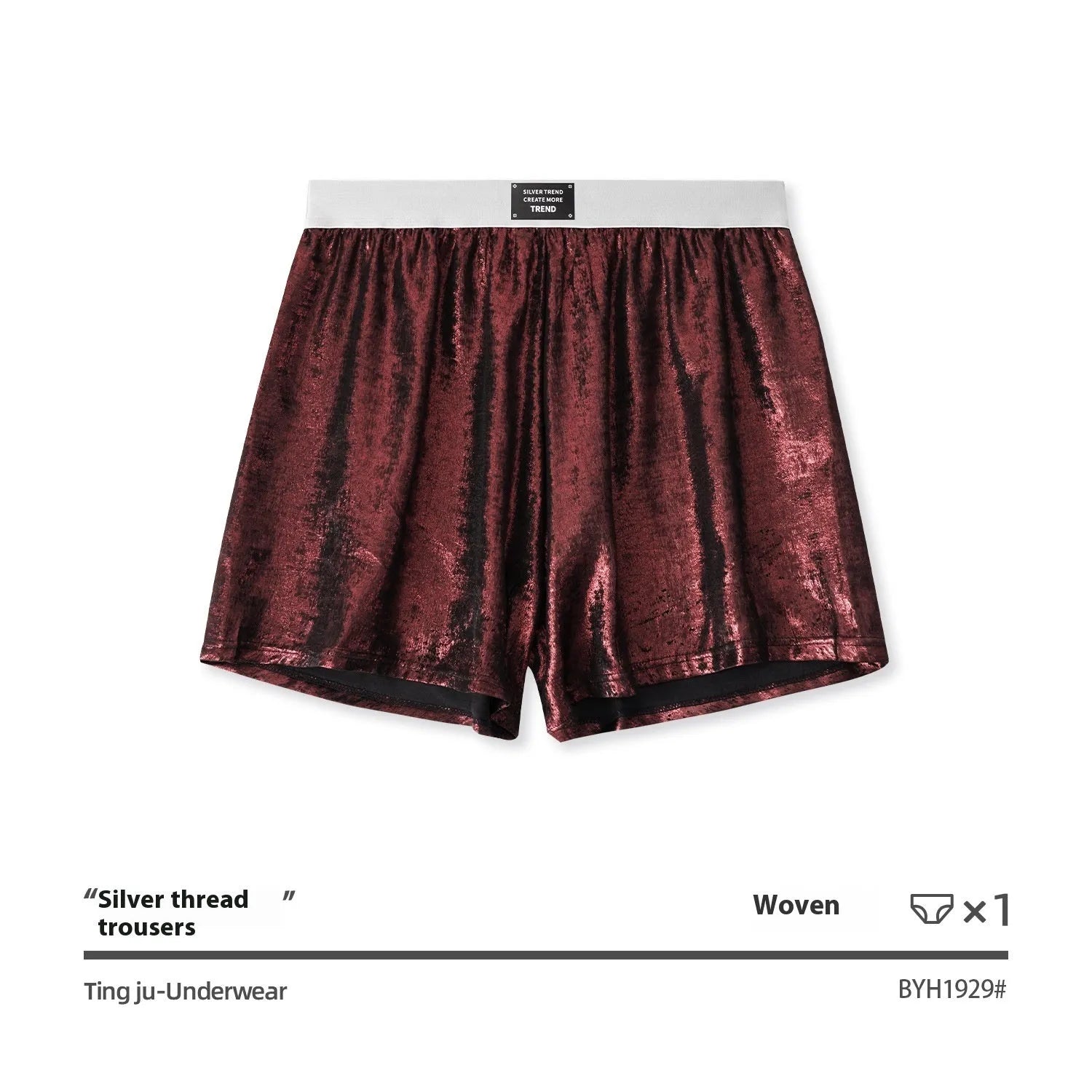 Man wearing galaxy reflective silver loose-fit woven polyester sports shorts.