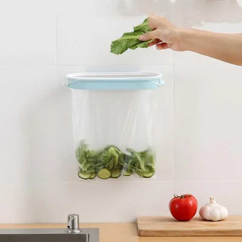 Plastic kitchen garbage bag storage rack in blue or pink for cabinet mounting