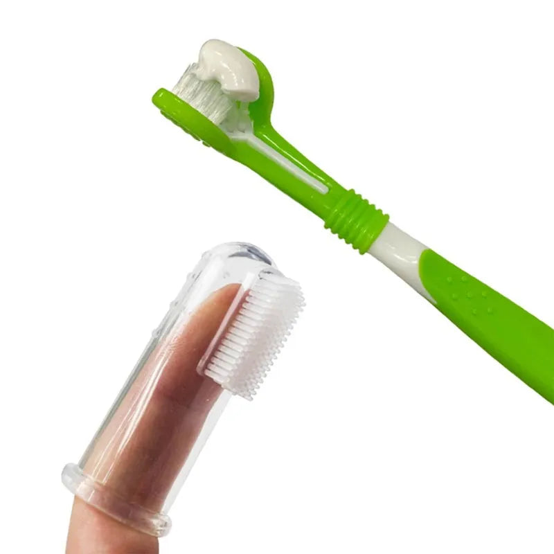 Green pet silicone finger toothbrush set with three-head dog toothbrush and PP handles on a light background