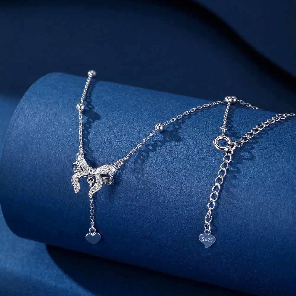 Silver butterfly heart pendant necklace on O-ring chain with adjustable length