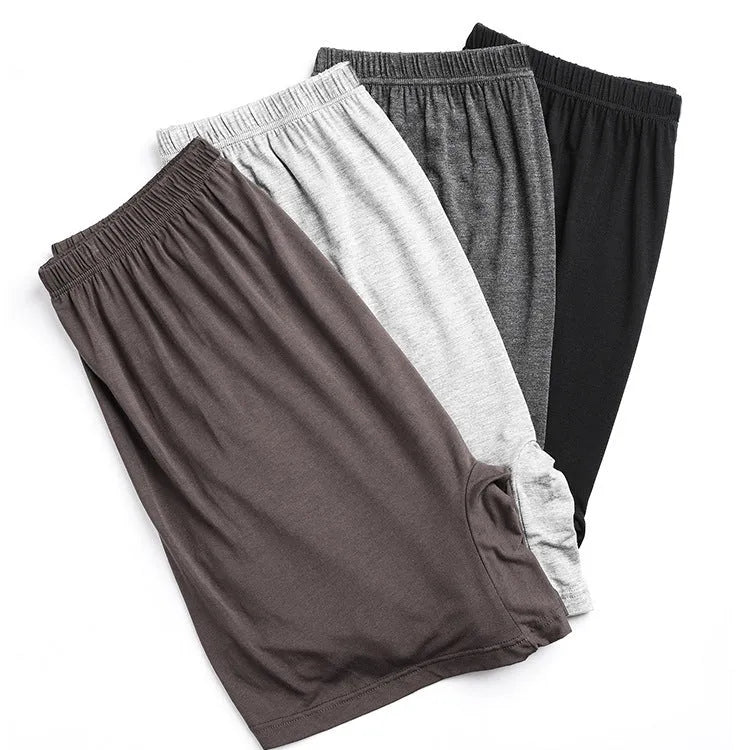 Men's solid colour modal boxer shorts with high waist, shown in multiple colour options.