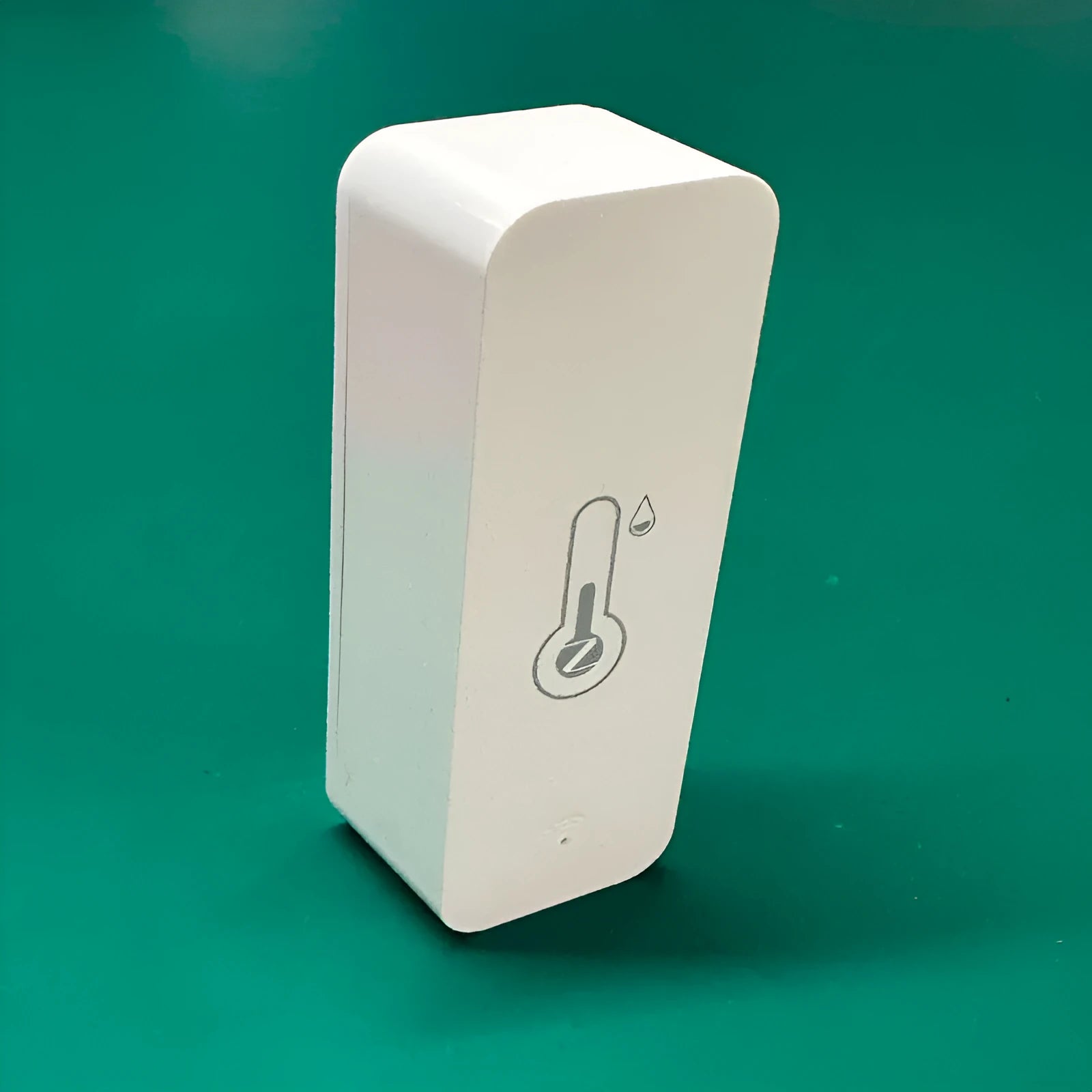 White WiFi temperature and humidity sensor with compact rectangular ABS housing measuring 72mm