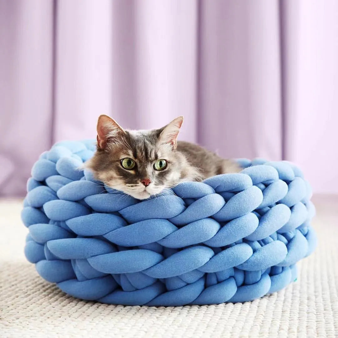 Round soft long plush cat house cushion in beige on a wooden floor, 40cm size option