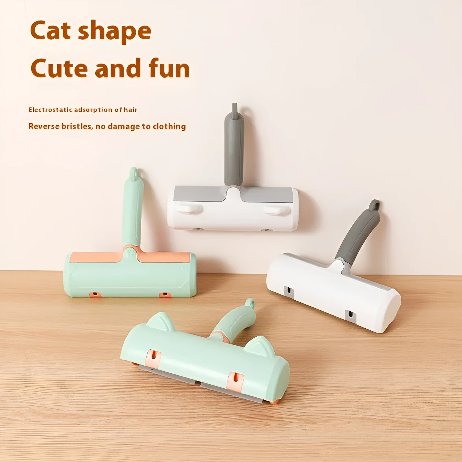 Mint green manual brush for removing cat hair from furniture and fabrics, showing its size.