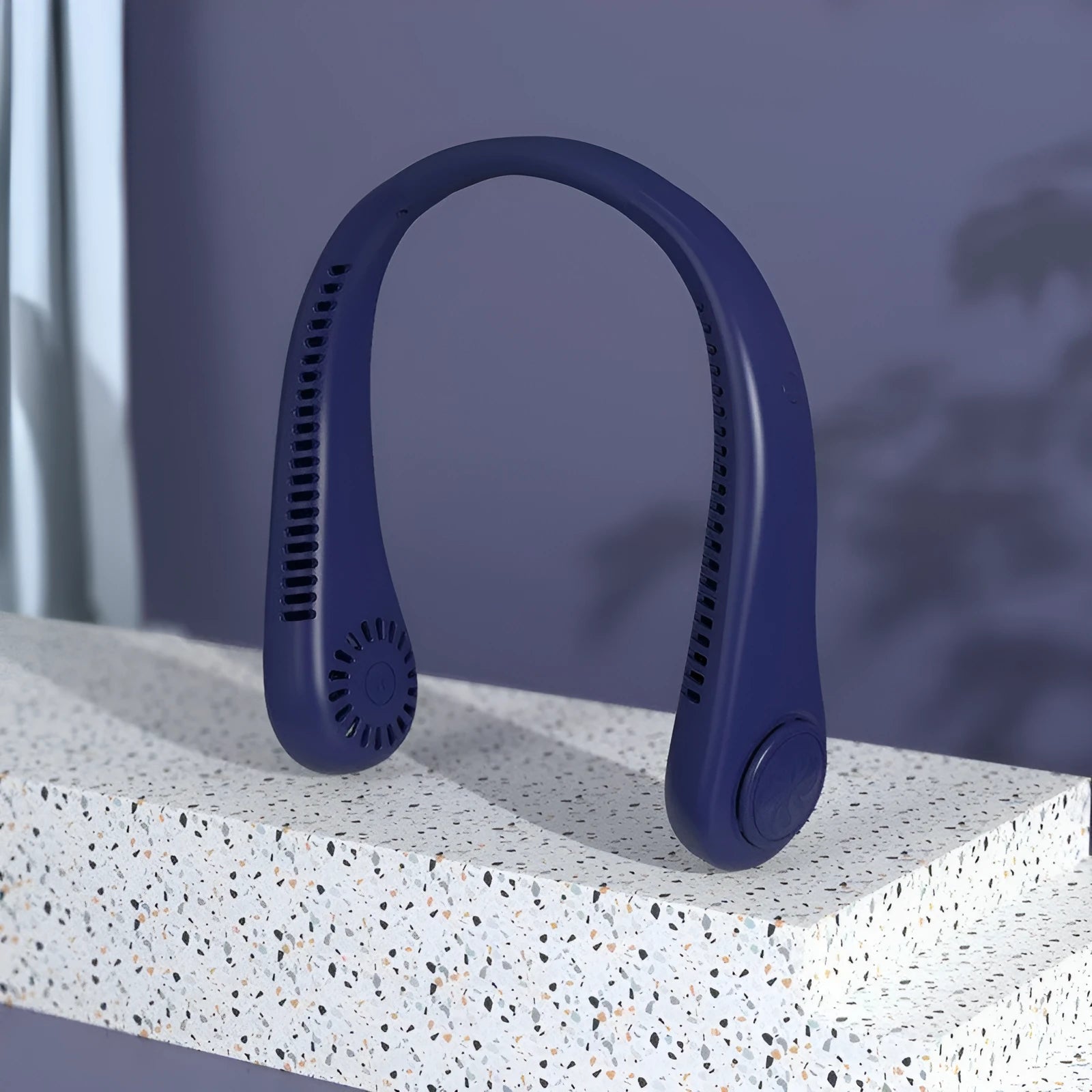 Blue portable bladeless neck fan with adjustable speed settings and USB charging port
