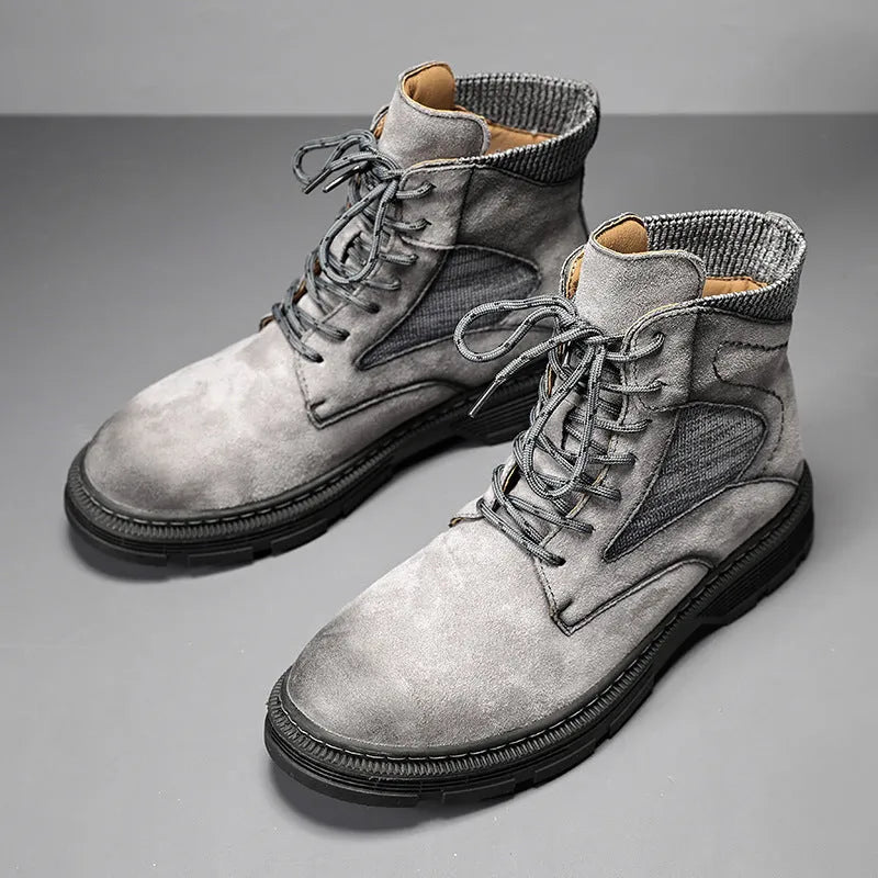 Men's vintage Martin boots in black with round toe, thick low heel, and rubber sole.