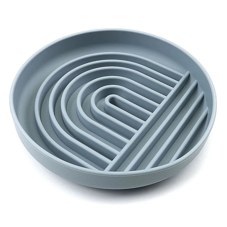 Silicone dog slow feeder bowl with ridges, shown in mustard green colour