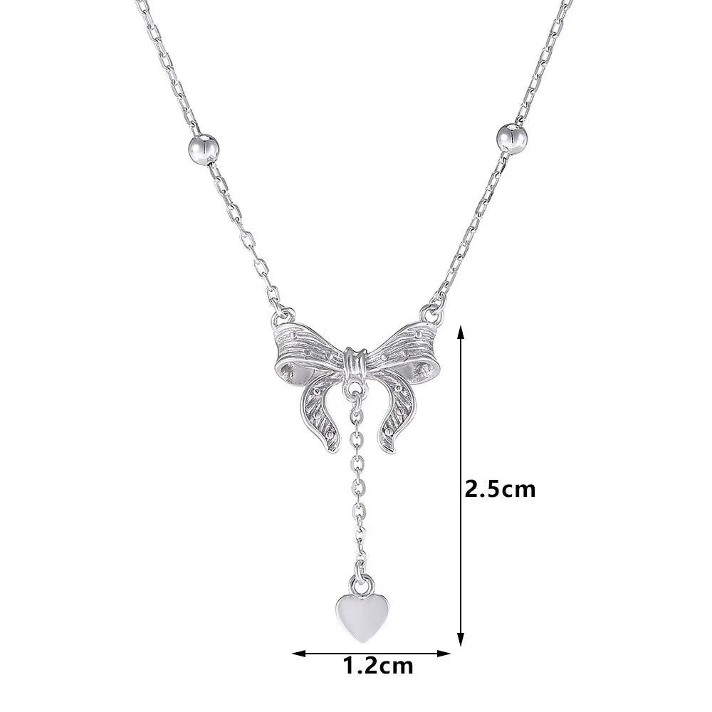 Silver butterfly heart pendant necklace on O-ring chain with adjustable length