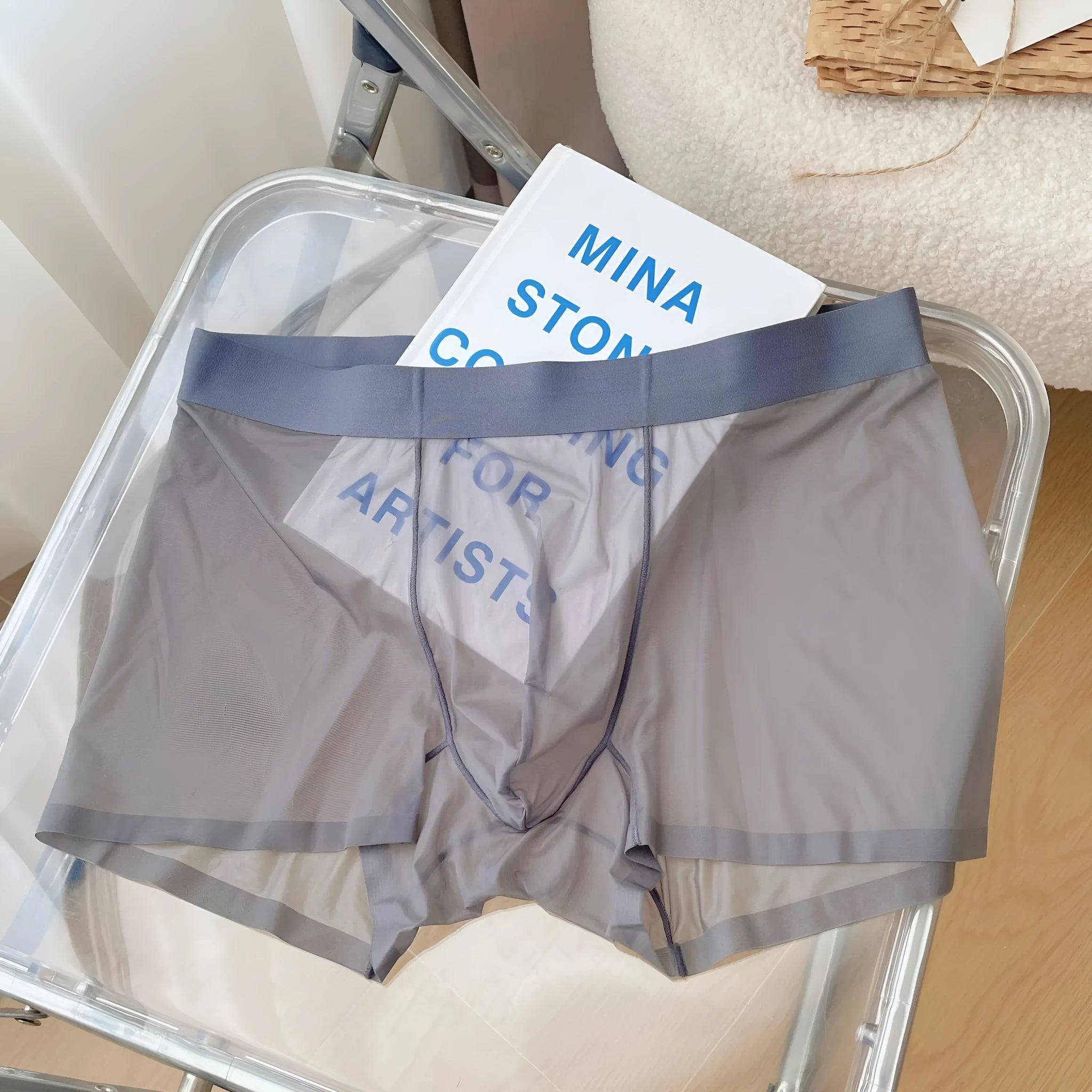 Men's thin seamless boxer shorts in knit nylon fabric, shown in light brown colour with quick-dry and breathable properties.