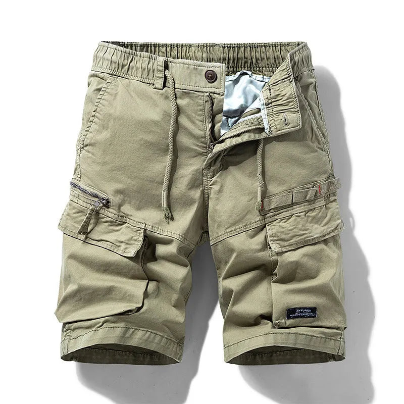 Men's army green cotton shorts with a zipper fly and multiple pockets, laid flat.