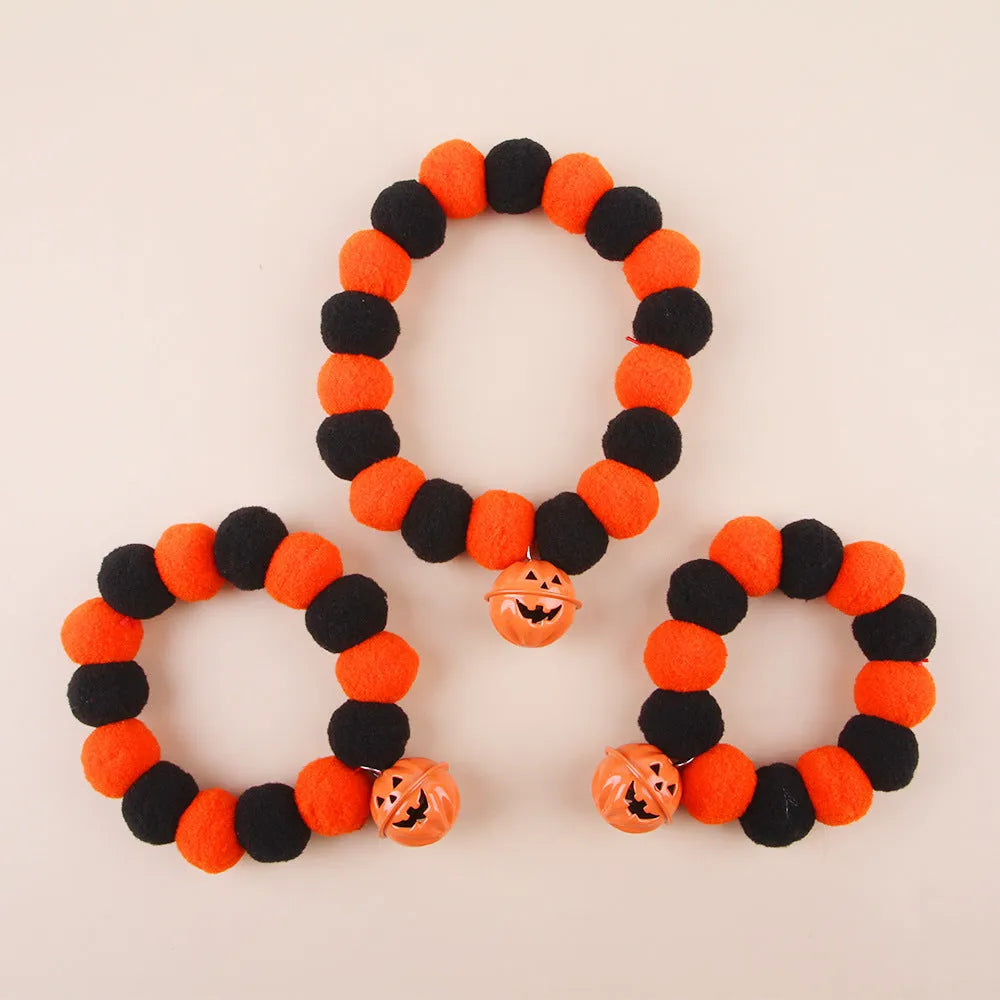 Halloween cat collar with pumpkin trick-or-treat design in three sizes