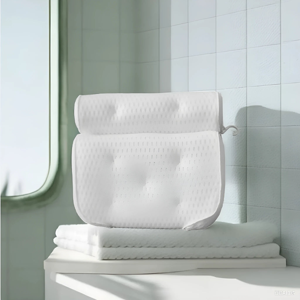 White bathtub pillow with 4D mesh fabric and seven large suction cups on a flat surface.