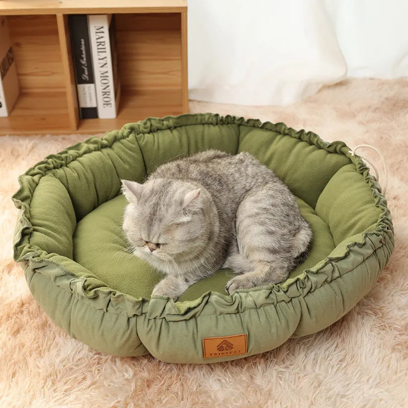 Grey and green reversible donut-shaped cat bed for indoor pets