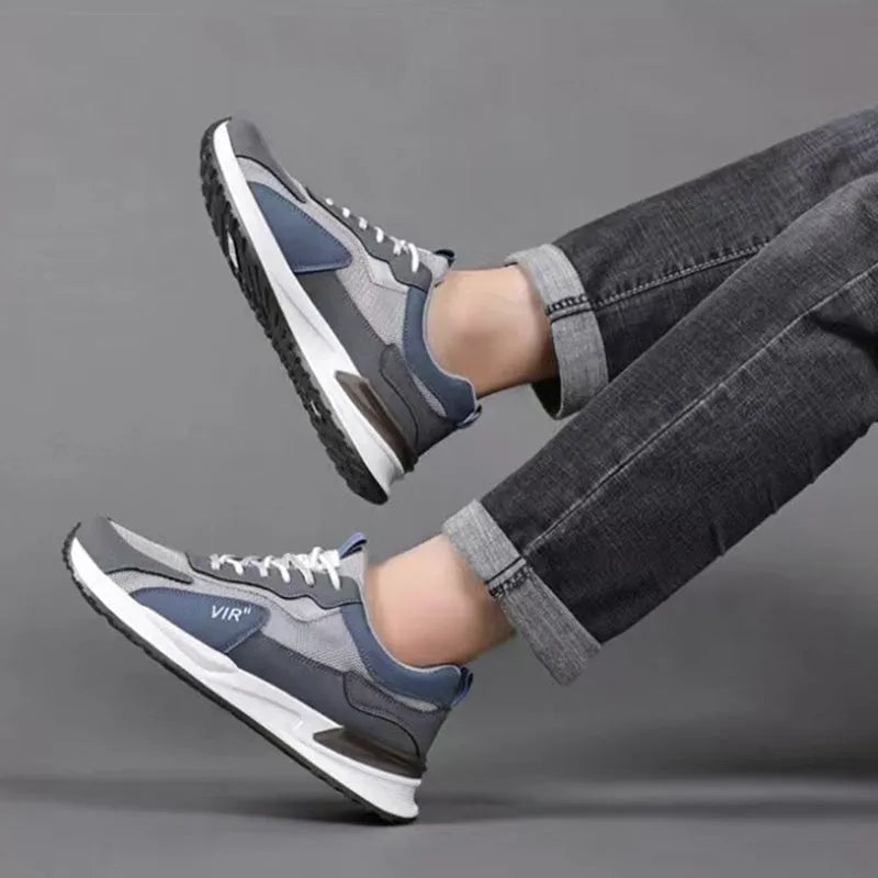 Men's colour block mesh sneakers in black, grey, or white on a plain background