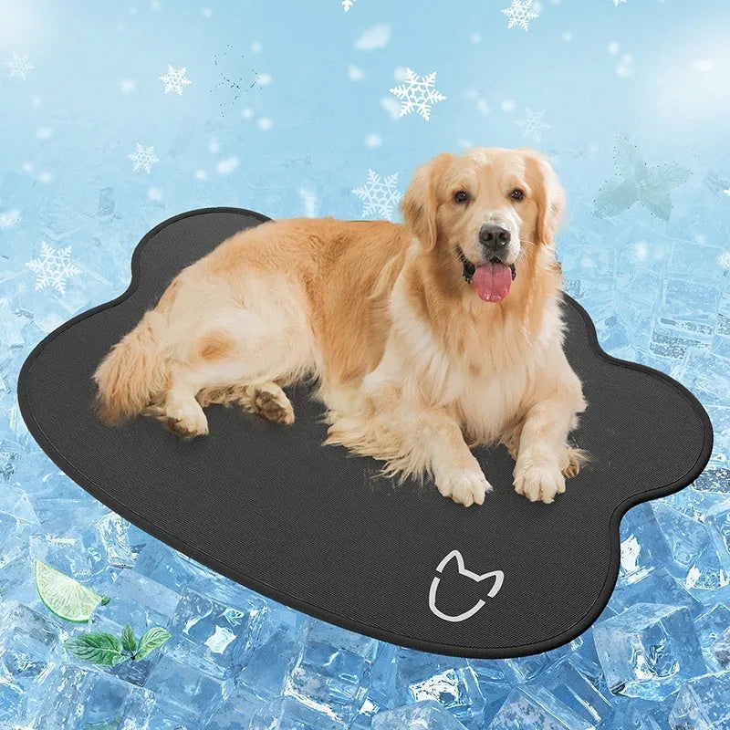Iced silk pet cooling mat in dark grey with a simple dog head shape, shown on a hardwood floor.