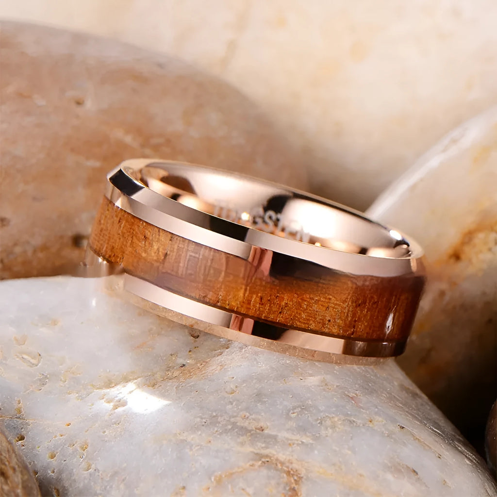 8mm wide tungsten ring with Ugyen inlay and wood leather accents in rose gold finish