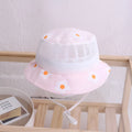 Floral baby bucket hat in blue with mesh fabric, side view showing brim and weft-knitted texture