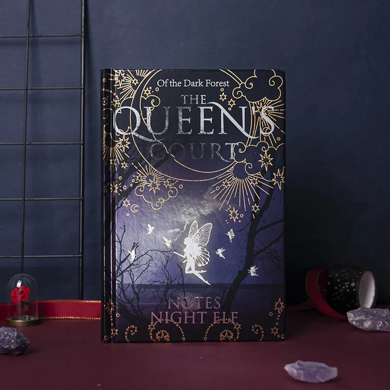 Blue and purple luminous hardcover A5 notebooks open to show full-colour illustrated interior pages