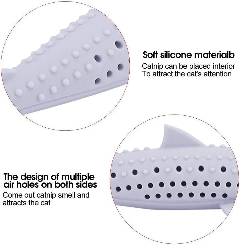Green silicone fish-shaped chew toy for cats on a white background