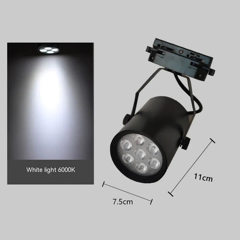 LED track spotlight with open-mounted slide design on black aluminium shell