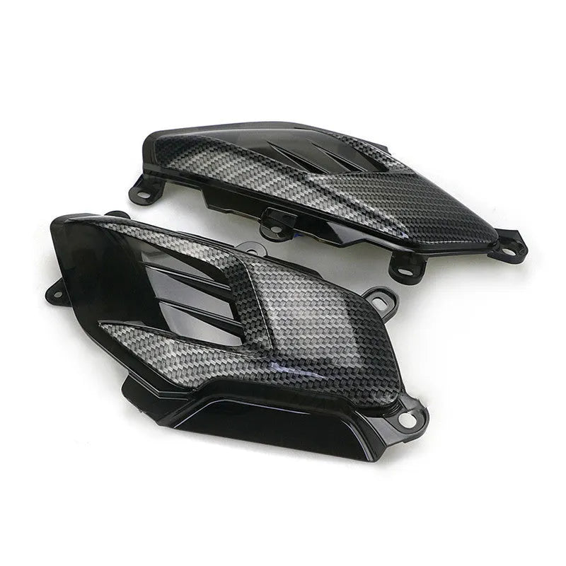 Pair of YAMAHA NMAX carbon fibre style LED side lamps, showing blue light option