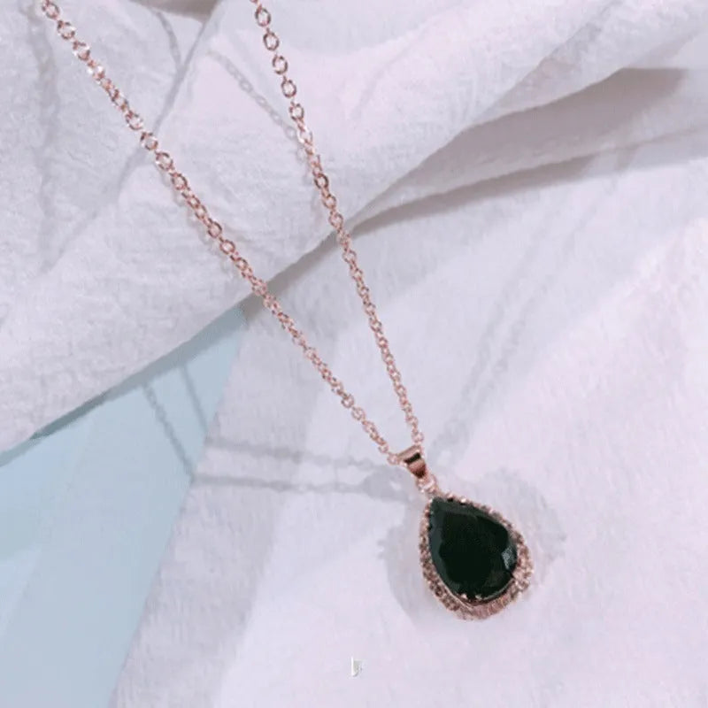 Rose gold geometric drop shape necklace with rhinestones in pink colour option