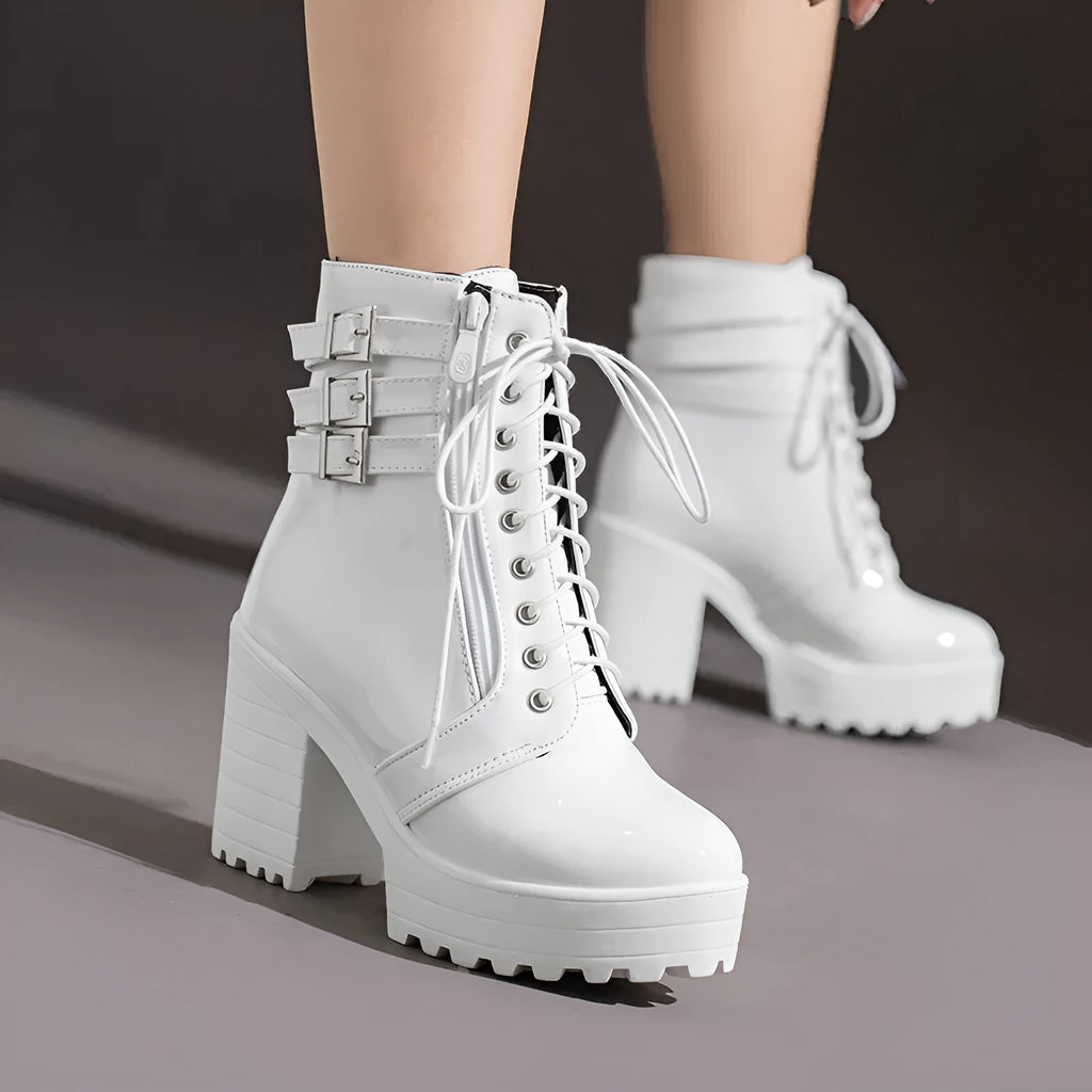 Women's black lace-up platform ankle boots with a round toe and a thick rubber sole.