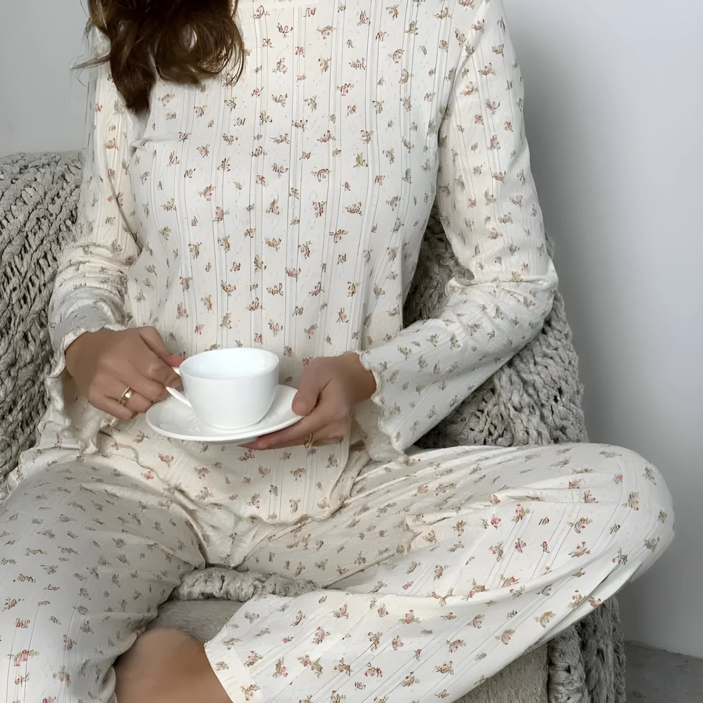White floral print women's lounge suit with bell sleeve top and wide leg trousers