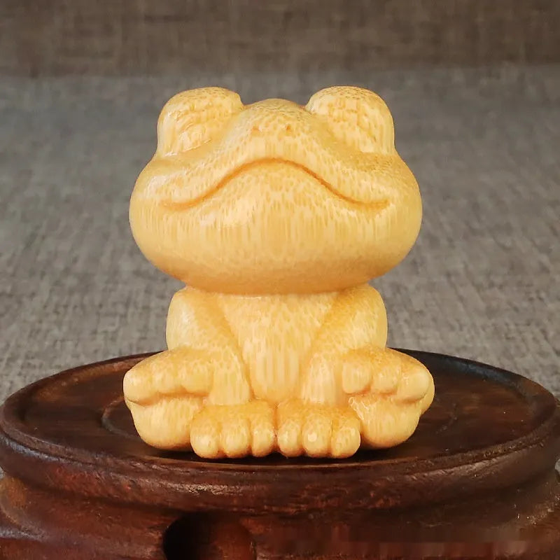 Solid bamboo carving ornament with smiling frog cartoon design, 5cm height