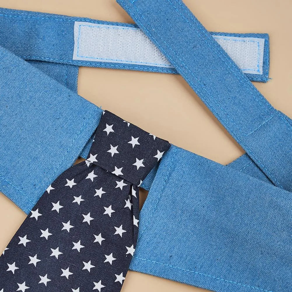 Blue denim dog collar with a star-patterned black bow tie, shown on a mannequin.