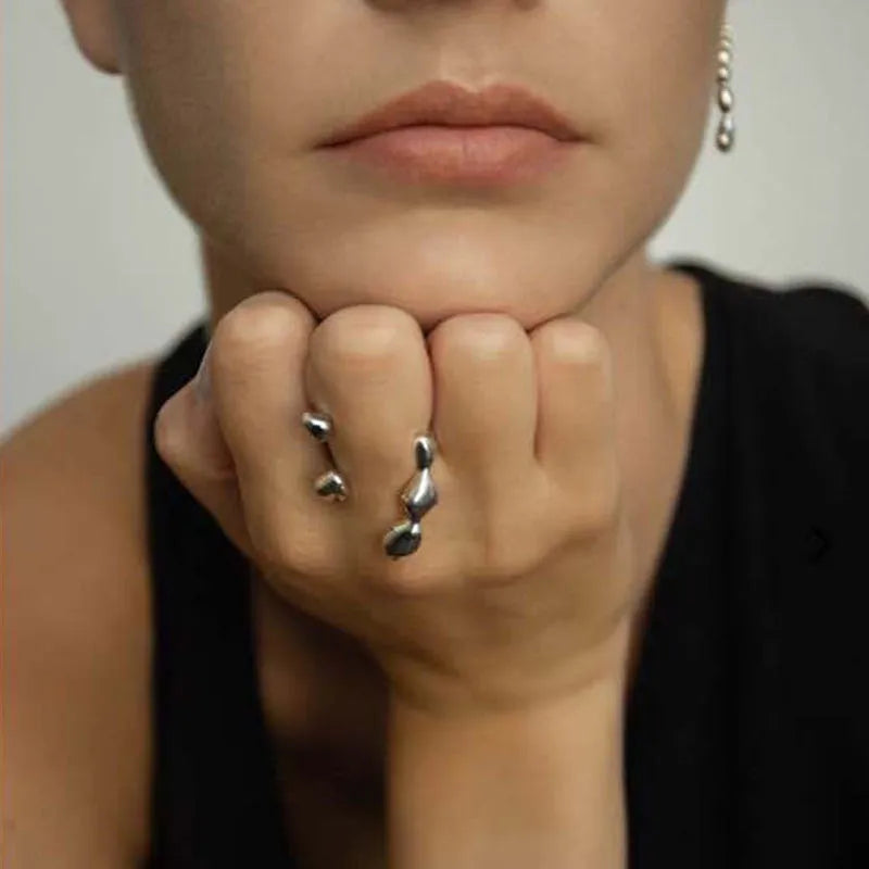 Adjustable open ring for women in brass with circular sphere design, gold or silver finish