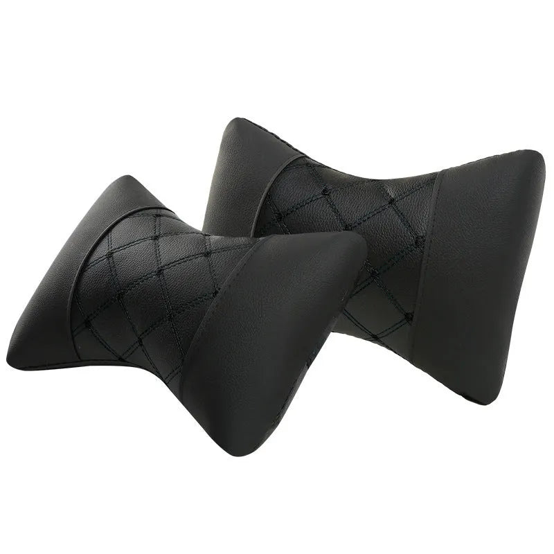 Quilted diamond-pattern black leather car headrest pillow for neck support.