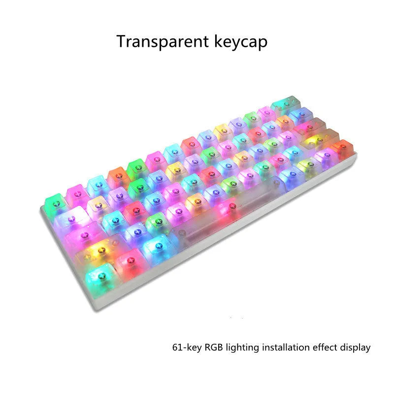 Transparent PBT keycaps set showing orange, white, blue, and black colours on mechanical keyboard