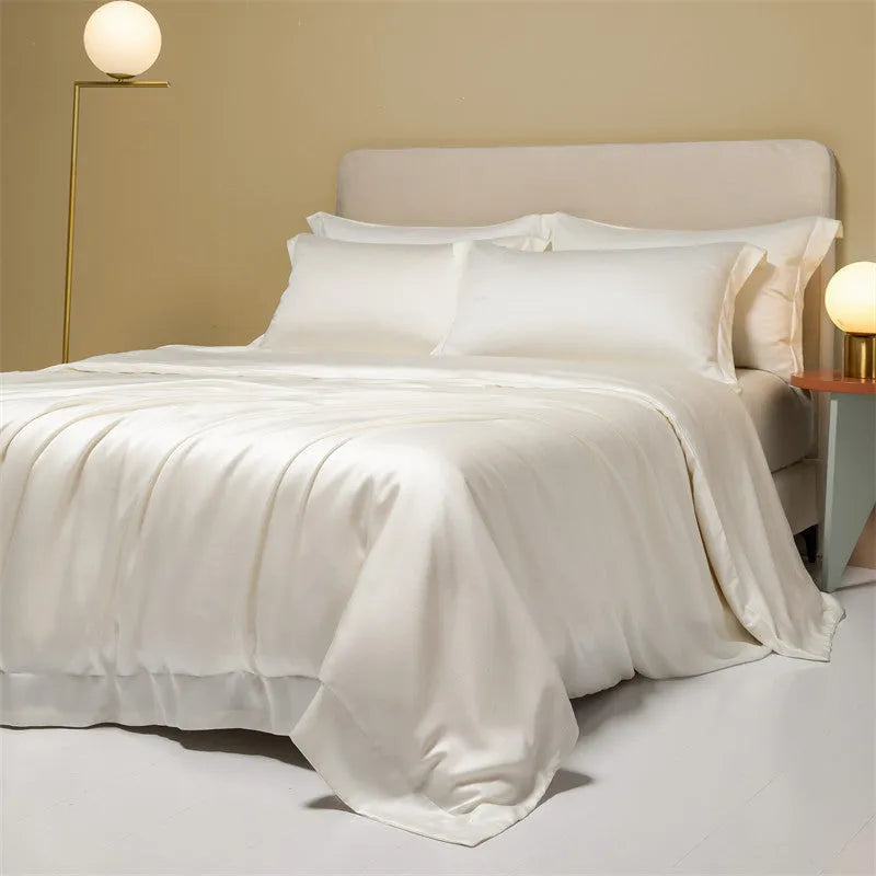 Luxury Tencel Lyocell bedding set with quilt cover, sheet, and pillowcases in grey.