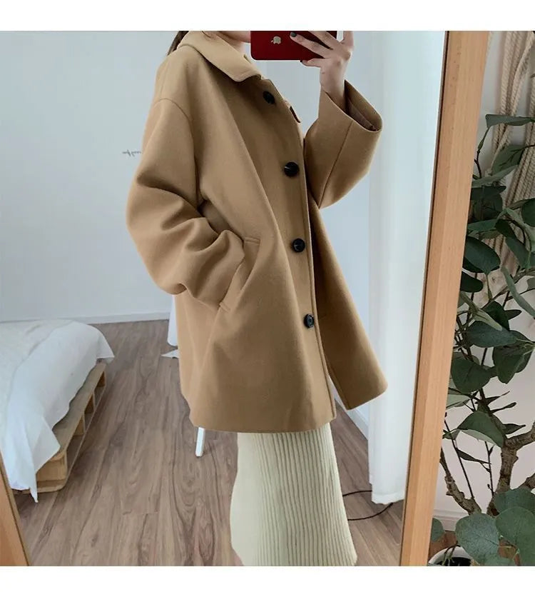 Women's Korean-style loose mid-length solid colour overcoat in black with long sleeves