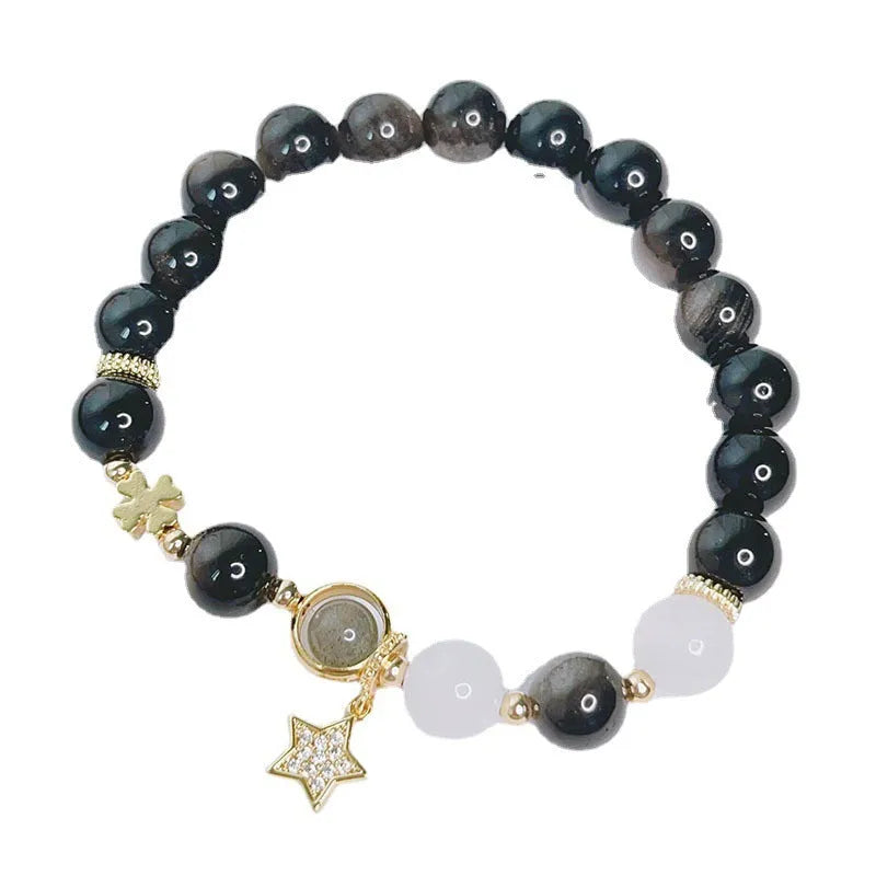 Silver stone bracelet for women with electroplated finish showing flower, love heart and star charm options