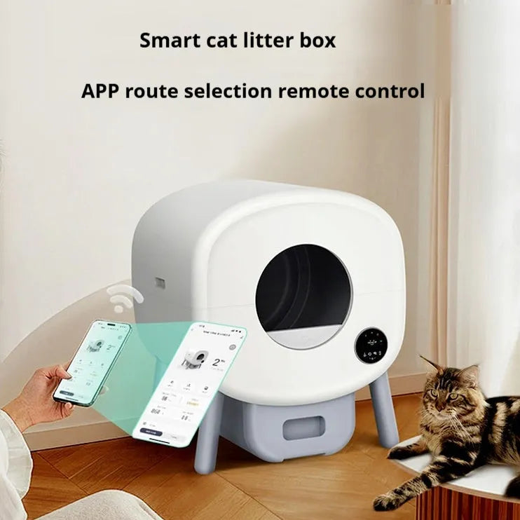 White automatic cat litter box with control panel, waste storage compartment, and cleaning mechanism