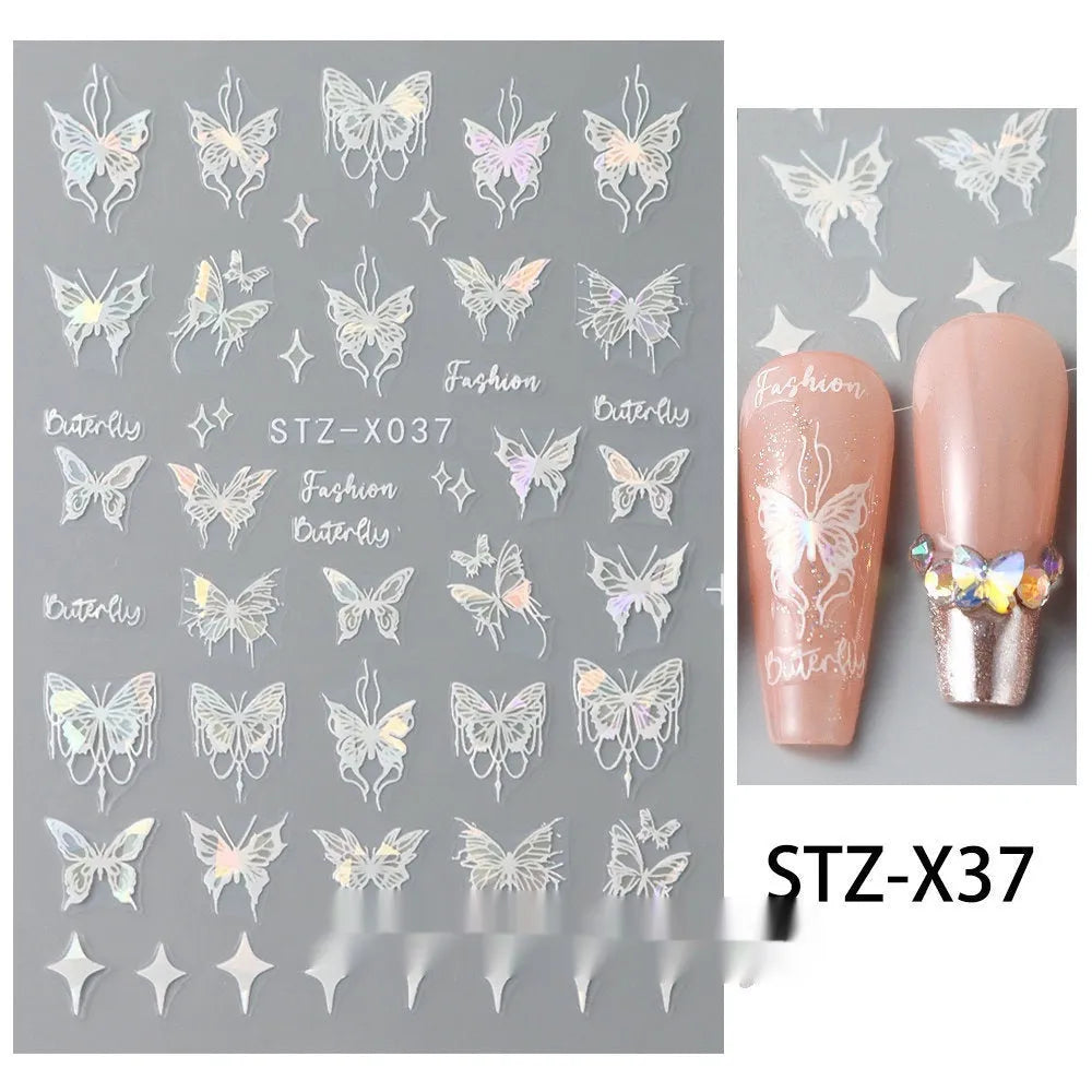 Pack of black and silver strip nail art stickers with cartoon and love pattern designs.