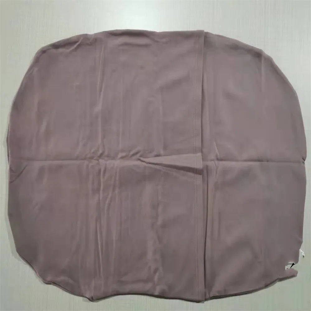 Beige portable baby nest crib for newborns measuring 75cm by 45cm on a neutral background.