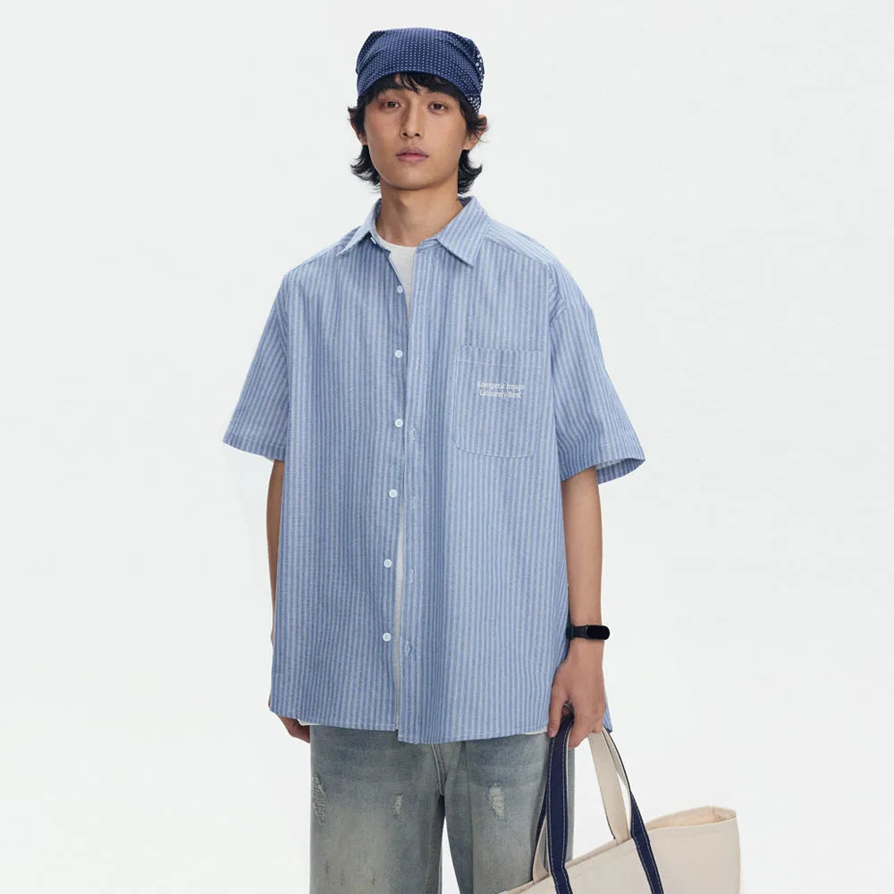 Blue striped unisex short-sleeve overall shirt in a loose cardigan style