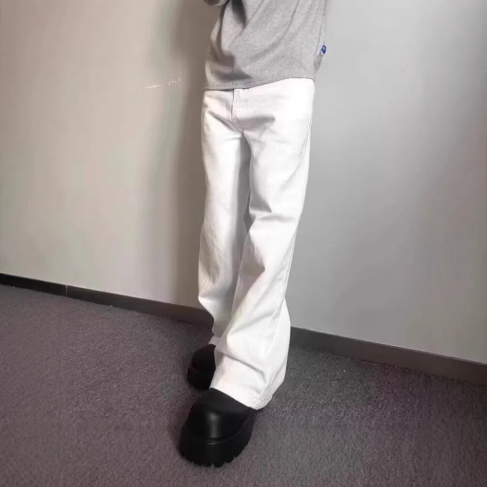 Men's white loose straight-leg jeans with wide leg openings and mid-waist design